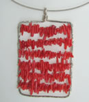 hammered sterling silver pendant with red coral chips