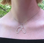 hand forged sterling siver mermaid tail pendant